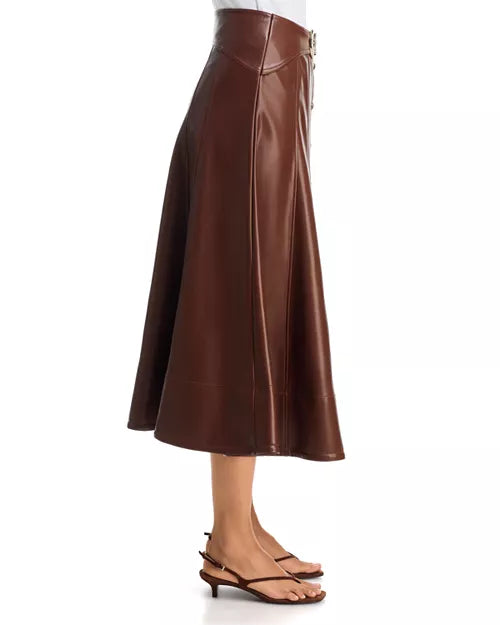 Back view of a model showcasing the paneled seaming and A-line silhouette of the Cinq à Sept Briony skirt.
