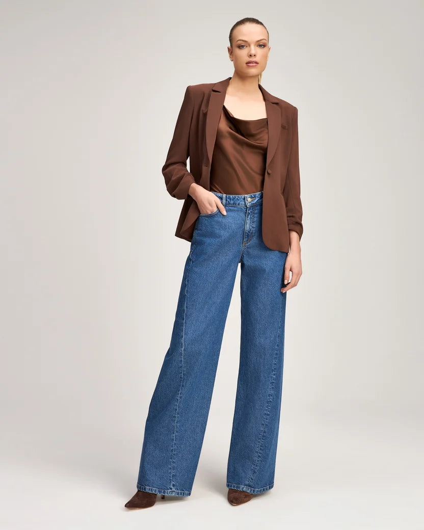 Full-body outfit view of the Cinq à Sept Marta silk camisole styled with a brown blazer and jeans.