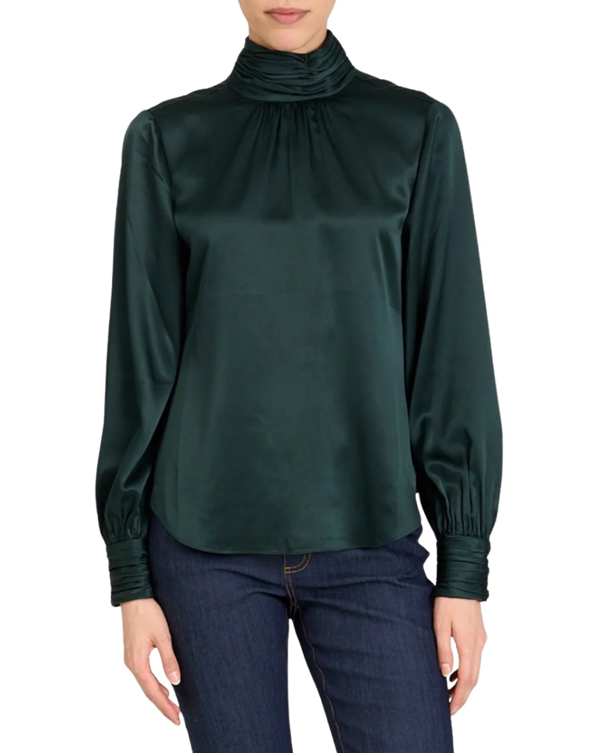 Woman wearing the Cinq à Sept Jayla satin mock neck blouse in Deep Malachite green.